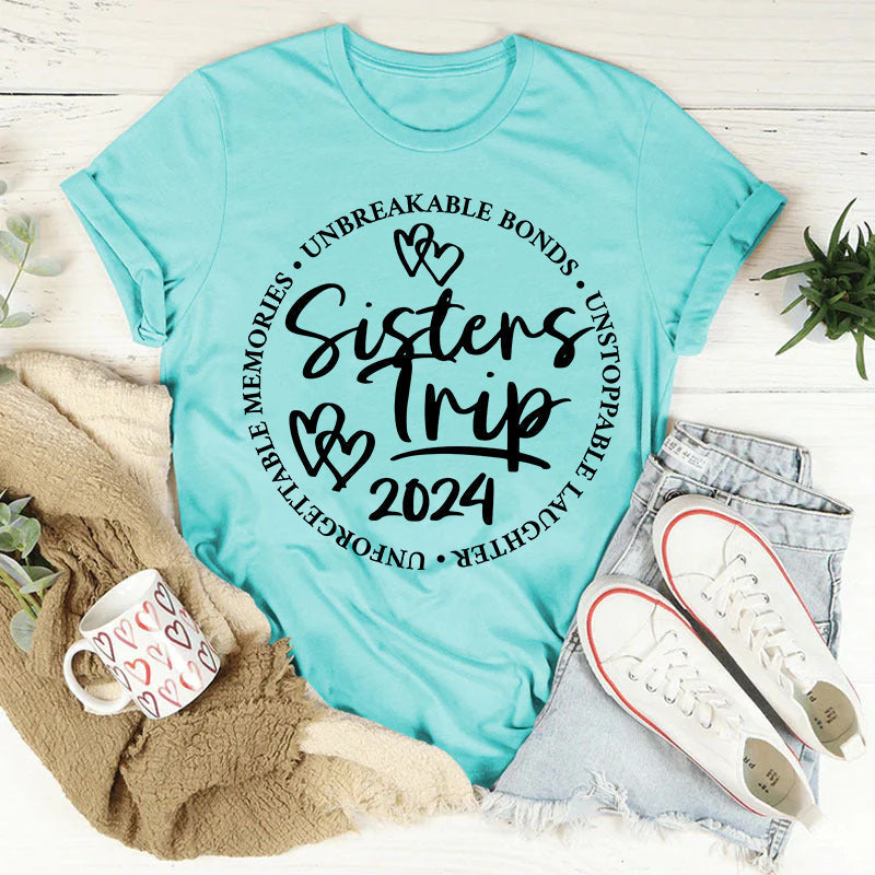 Camiseta feminina com slogan da Sisters Trip 2024 com estampa de letras